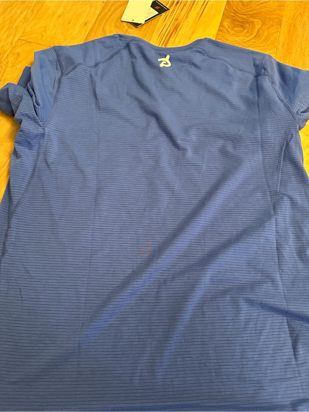 Peloton NWT Men's Performance Short-Sleeve Shirt - Blue medium